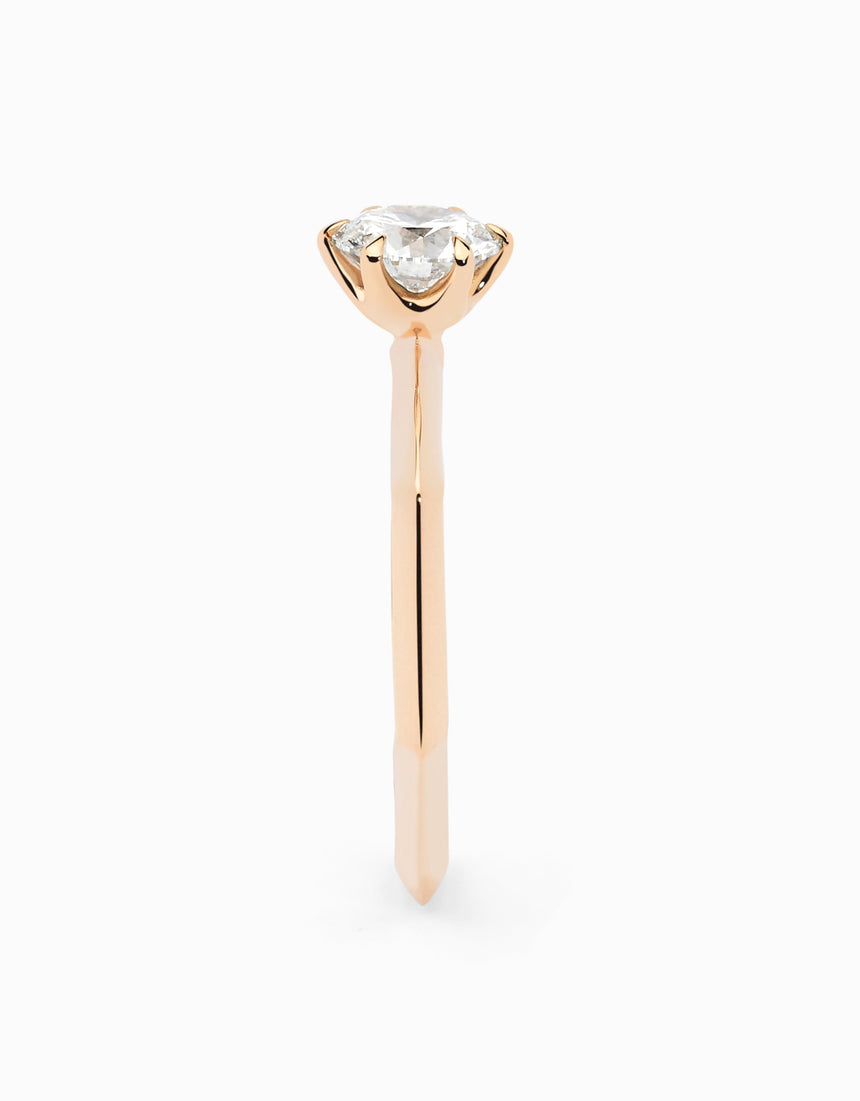 Anell solitari de compromís amb diamant natural